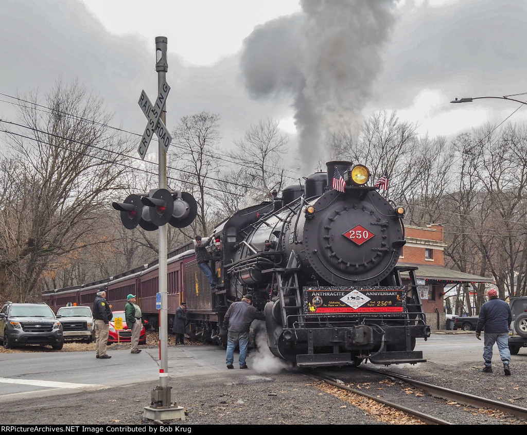 CNJ 113 coupling onto the train at Minersville depot (exReading